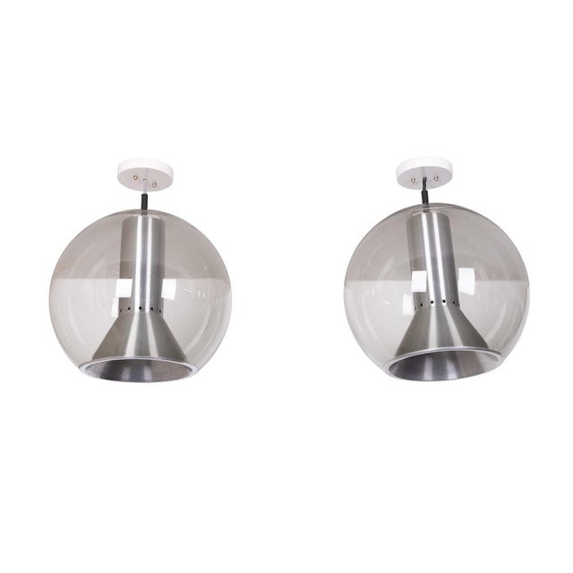 We hereby offer our raak globe pendant lamps (the large version), in good condition, designed by frank ligtelijn in the...