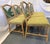 Vintage set of six McGuire Style dining chairs from the late 20th century. They have heavy metal frames wrapped in natural...