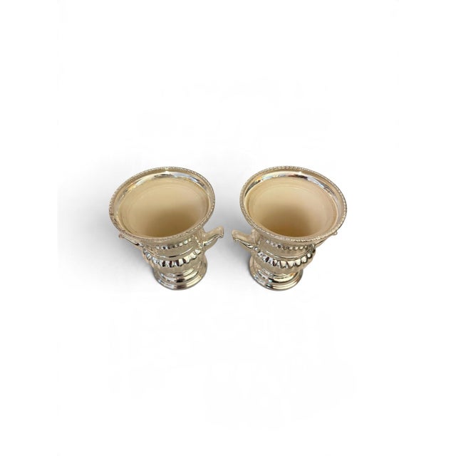 charming vintage miniature silver-plated trophy urn, beautifully crafted in England. Featuring a classical campana...
