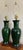 Gorgeous pair of forest green porcelain urn form table lamps set on a ceramic scroll-foot base. Please see condition...