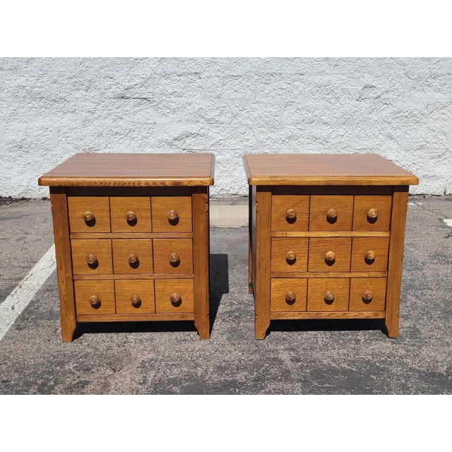 Beautiful pair of large scale Mission style oak nights stands. Each nightstand features 3 drawers. They are in excellent...