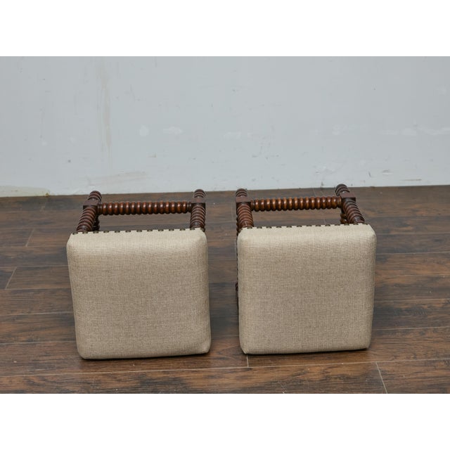 This pair of 19th-century English stools brings timeless character with their hand-turned bobbin legs and warm hardwood...