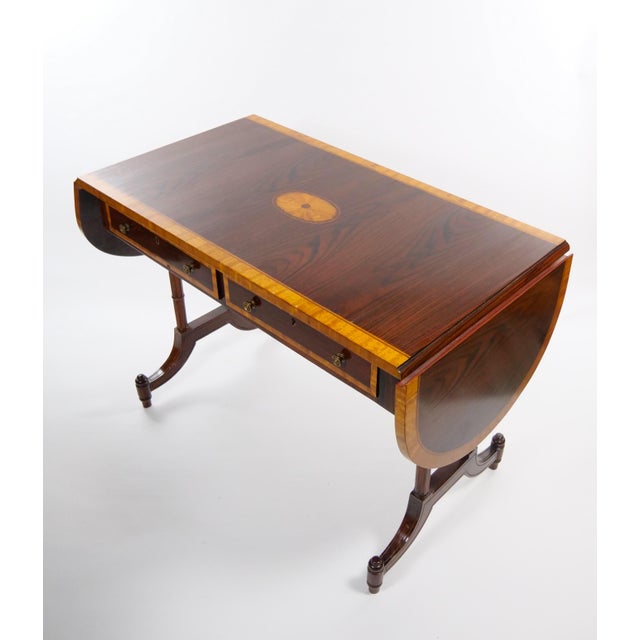 Elegant antique mahogany console table, dating to the mid to late 19th century, circa 1870–1880. The table features a...