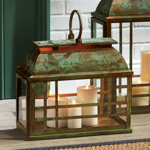 With an uneven patina, the Solana Lantern has a weatherworn look. With an open, vented design that lets the glow peek out,...