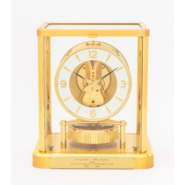 Jaeger-LeCoultre Atmos "Caliber 540" Mantle Clock, 1987, brass and glass, the circular the dial with Arabic and diamond...