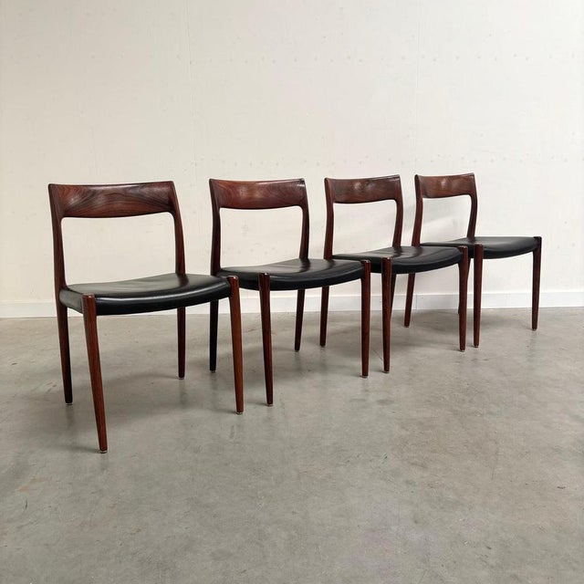 Remarks: Set of 4 Niels Otto Møller dining chairs, model 77. Danish design, produced in the 1960s. Dark wooden frames with...