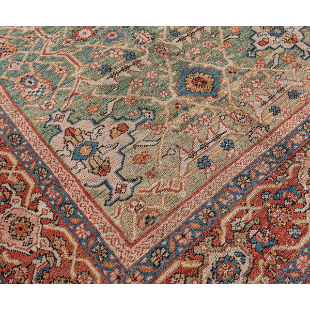 This luxurious Persian rug belongs to the Sultanabad type, famed for their brilliant colors and exquisite designs....