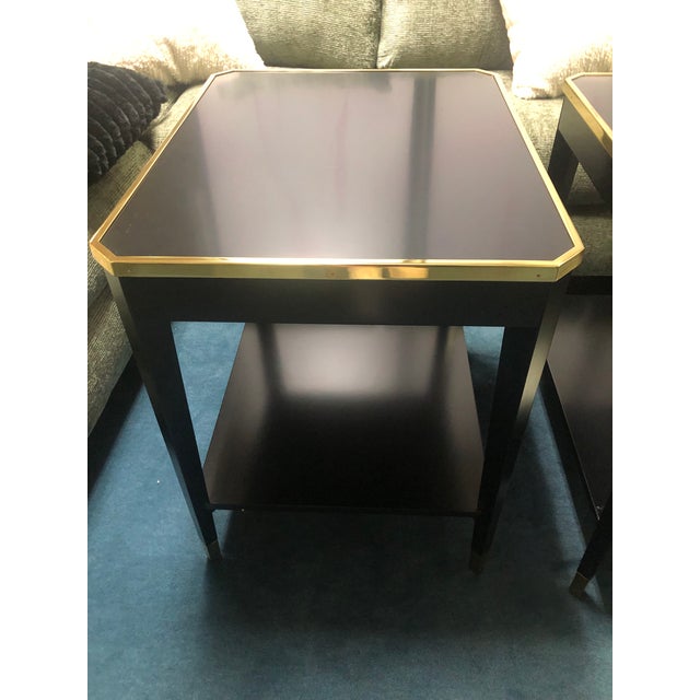 The Wilson End Table is designed for both aesthetic appeal and practical living. Its solid wood construction and ebony...