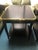 The Wilson End Table is designed for both aesthetic appeal and practical living. Its solid wood construction and ebony...