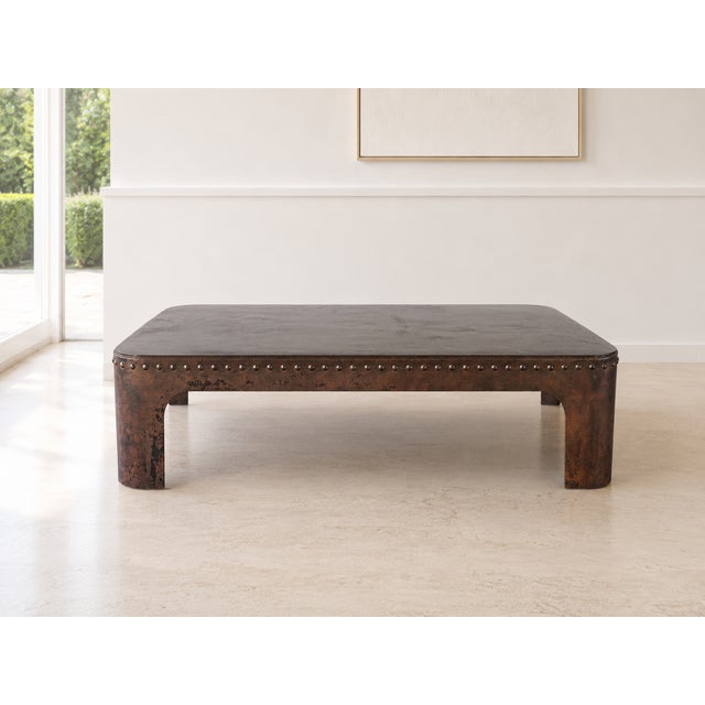 An old riveted metal coffee table with a raw and authentic feel, our model was custom-made from an old water tank from a...