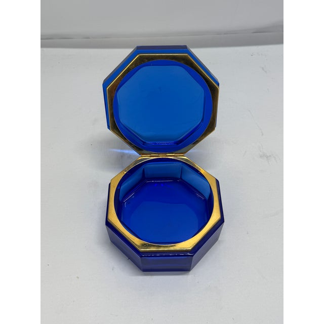 A striking mid-20th-century cobalt-blue glass casket, probably Italian Murano or French studio production, of octagonal...