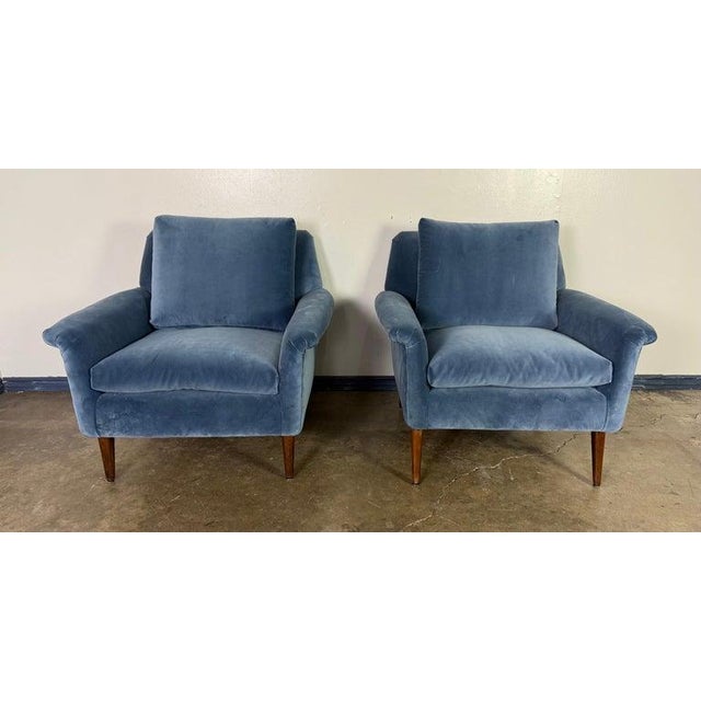 A pair of Mid-Century Modern lounge or easy chairs designed by Folke Ohlsson (Sweden, 1919-2003) for Fritz Hansen...