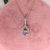 Modern Tanzanite Pendant with Earth Mined Diamonds in Solid 14K Dual Tone Gold Oval 6x4mm For Sale - Image 3 of 5