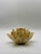 Handcrafted ceramic lotus flower candle holder featuring layered sculpted petals in a warm cream glaze. Designed to hold a...