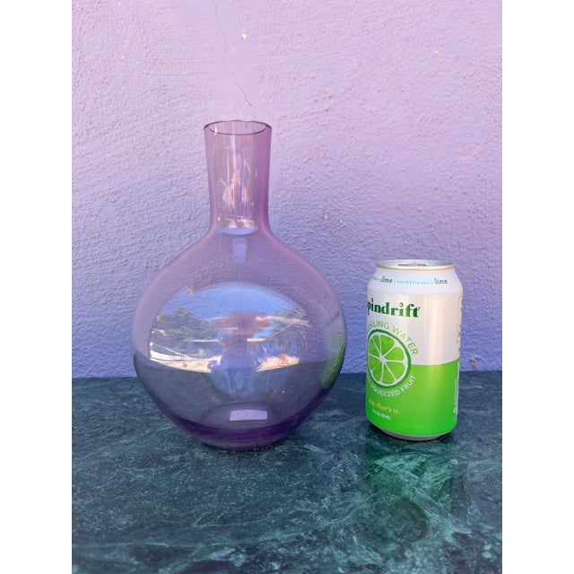 Light purple / lavender glass vase. Hand made in Poland by Alicja. Neck of the vase is 3” tall and opening is 1.5” across.