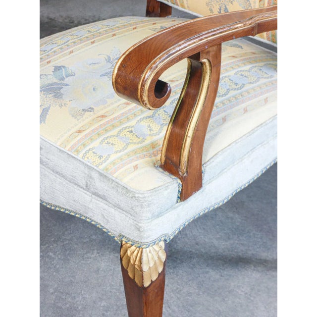 Pair of armchairs empire style in walnut wood with gilt details period 20th century material walnut wood, upholstery and...