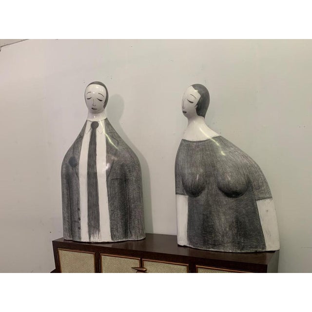 Yuri Zatarain graffite on glazed earthenware. He and She with half-closed eyes lingering in a pleasant thought a thought...