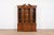 A gorgeous Georgian or Chippendale style lighted breakfront bookcase or dining cabinet By Henredon USA, Circa 1980s Carved...