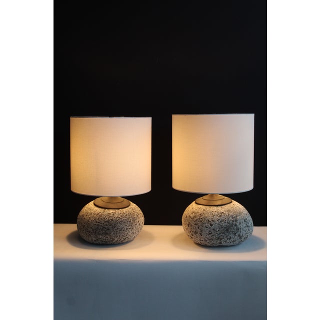 Unusual pair of Charlotte Perriand influence lava lamps,The bases are lava,texture and porous surface. Mix of chacoal...