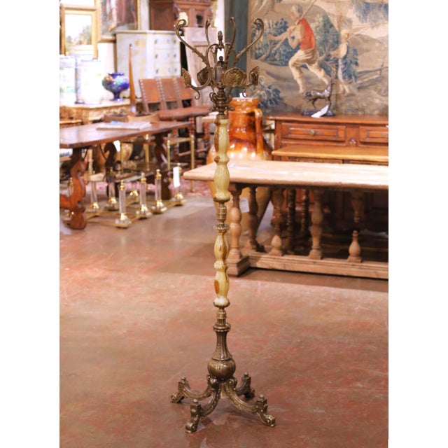 Crafted in Italy circa 1930, this elegant antique standing hall tree brings both sculptural presence and practical...