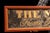 Vintage painted smaltz trade sign produced by Gaard's Graphics of Aspen, Colorado for The Mesa Store, a home furnishings...