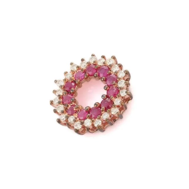 This is part of Chairish’s Fine Jewelry assortment. Natural ruby and diamond circle pendant in 14K Gold. It has a round...