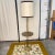 Mid century modern floor lamp with table attached mid way on the lamp. Includes the original shade which is in good...