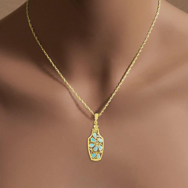 ♥ Product Summary ♥ Main Stone: Australian Opal Metal Purity: 14K Yellow Gold Stone Cut: Pear Dimensions: 33mm x 13mm...