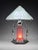 A striking Art Deco-inspired table lamp designed by Rick Ramirez for Dereco Lighting, blending classic Machine Age...