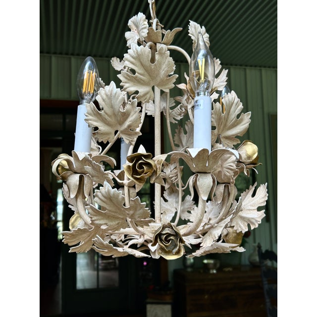 Sophisticated Holywood Regency Tole Chandelier featuring Champagne Beige Leaves and Antique Gold Roses. Chain included,...