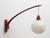 60s wall lamp. Swiveling arm, teak massive. Drop -shaped glass shade made of opal glass, slightly structured. (Diameter...