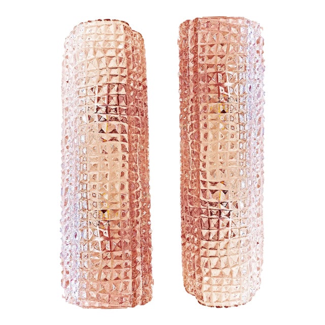 Set of two Organic style wall sconces in Murano glass. Scenographic pink color for italian luxury sconces. Luxury and...