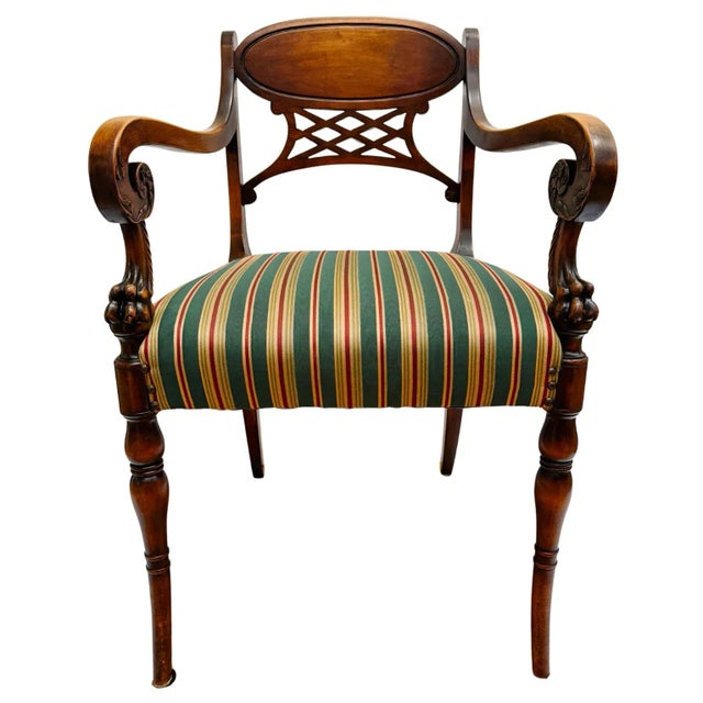 This beautiful English Regency armchair is a fine example of 19th-century design, a mix of neoclassical influences of both...