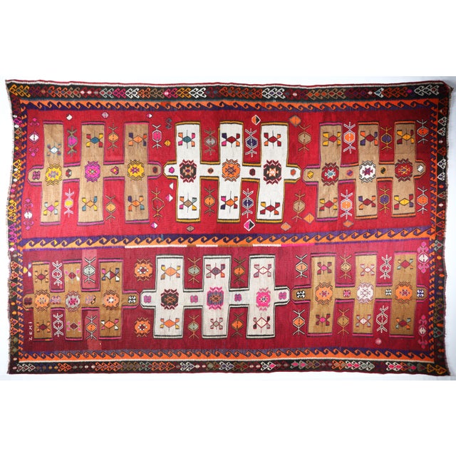 This striking oversized Kars kilim is a masterful example of Eastern Anatolian tribal weaving, showcasing bold geometry,...