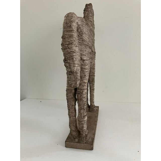 Striking large-scale (19"h x 19" w) horse sculpture crafted in cast resin with a heavily textured, hand-finished surface...