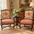Pair of antique French Louis XV style carved walnut fauteuil armchairs, newly upholstered in a large-scale Jacobean Tree...