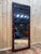 Large Empire period floor mirror, first quarter of the 19th century, with a rectangular frame of solid wood stained dark...