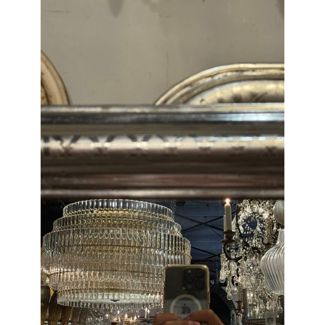 These pair of 19th-century French Silver Louis Philippe mirrors exude elegance and sophistication in any home décor...