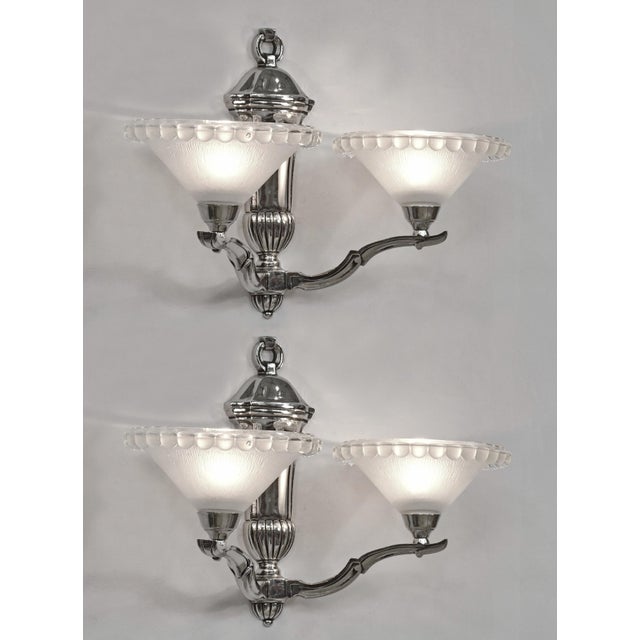Hubert Petitot & Jean Gauthier A nice pair of French art deco double wall sconces in nickel plated copper alloy (bronze or...