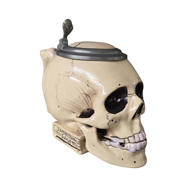 antique German skull mug with pewter hinged lid. Great condition. please note that the top of skull, inside the pewter lid...