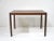 A nice well crafted teak wood side/end table with great graining having angled rosewood legs to each corner . The mix of...