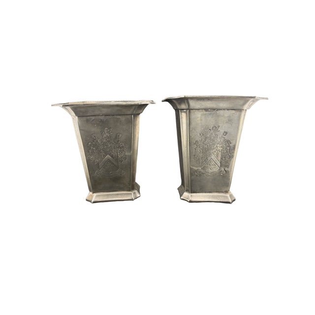 Beautiful silver tapered shape, a flared rim, and a large engraved coat of arms.
