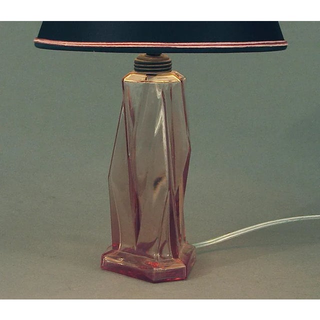 Here's something quite special for the advanced collector of American Art Deco/Moderne objects. The faceted base, made of...