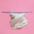 A coffee table raised on four dolphin heads — a whimsical coastal base with roots in classical grotto and Regency design....