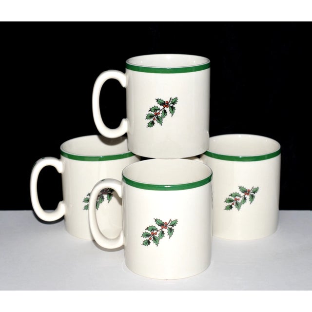 Celebrate the season with this charming set of four Spode Christmas Tree mugs, featuring the iconic 1938 holiday tree...