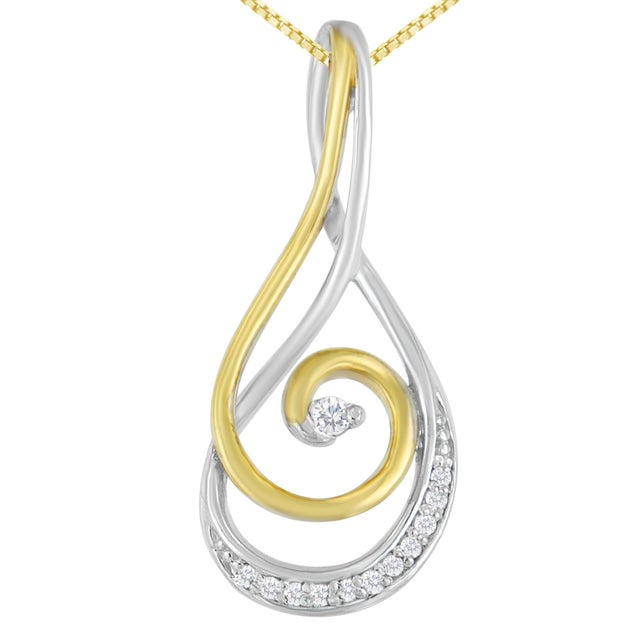 Cascading down to create two elegant spirals, each curve of this exquisite pendant is lined with glittering diamonds....