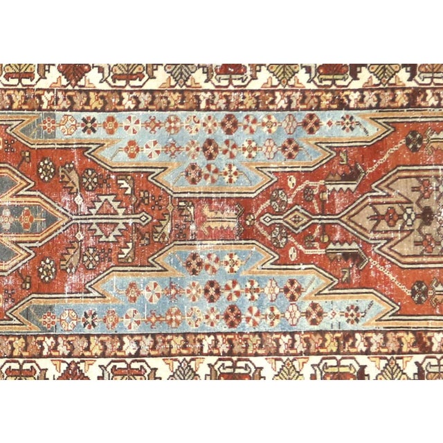 1930s Persian Melayer Runner. Hand woven in the Hamadan region of Iran. Distressed and refinished in the U.S. The Persian...