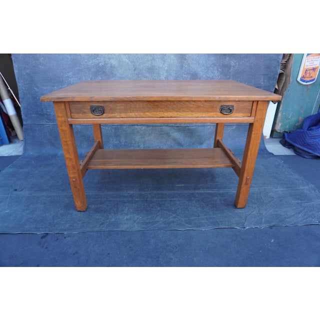 Measures 48" wide x 29 1/4 deep x 29 7/8" tall. Original label. Original finish.