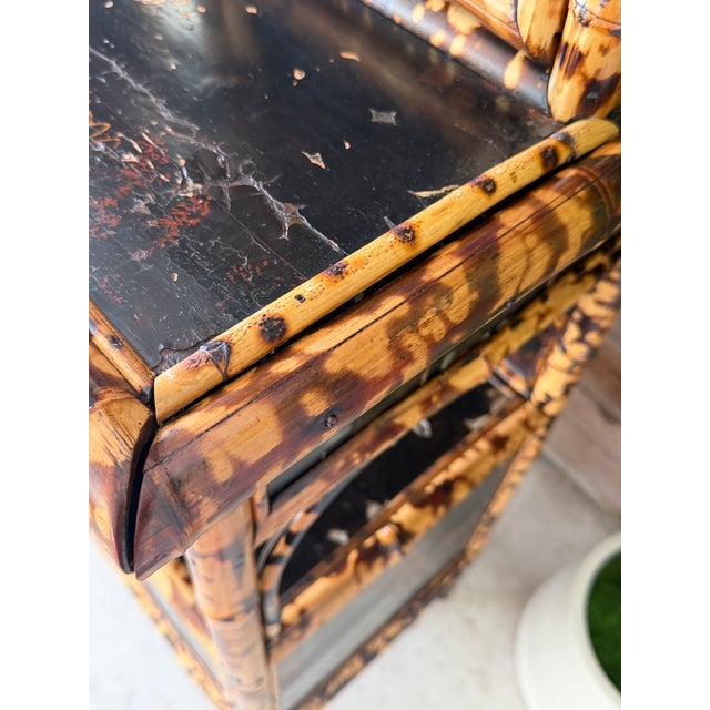 Spectacular late 19th-century English Aesthetic Movement cabinet étagère executed in richly figured tortoiseshell bamboo...
