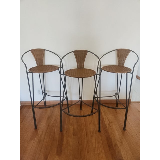 Phenomenal set of three vintage bar stools. These stool were purchase in France, circa late 1980s - early 90s. Comprised...